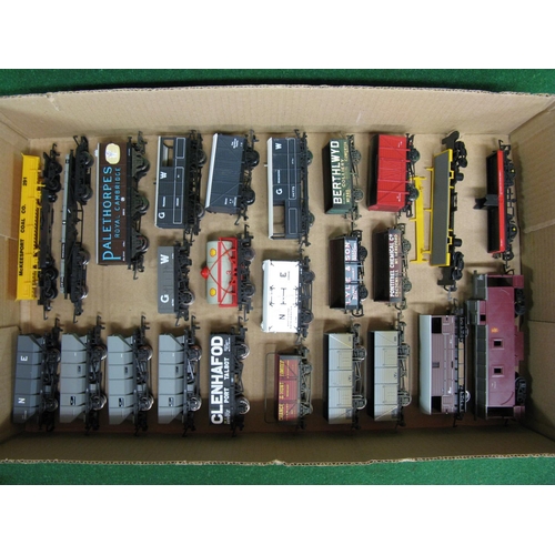 497 - Twenty five loose playworn Hornby and Triang OO scale wagons and Guards vans