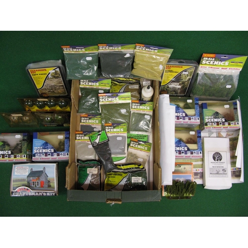 517 - Quantity of mostly packaged OO scale scenery items to include: trees, scatter materials, back scenes... 