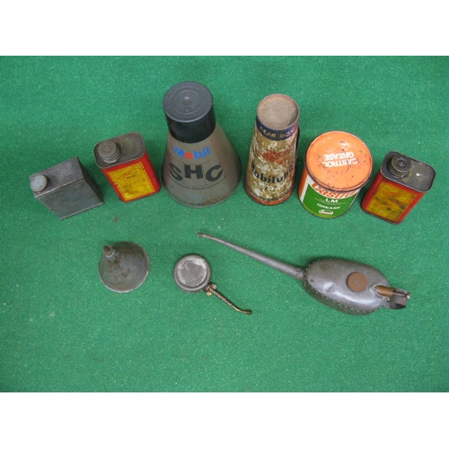 52 - Assorted oil and grease cans to include an unopened Mobilube C SAE, 140 Gear Box Oil etc