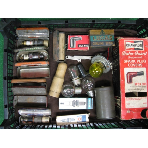 53 - Quantity of sparkplug tins, some plugs, caps, empty plug cap box, bulbs etc