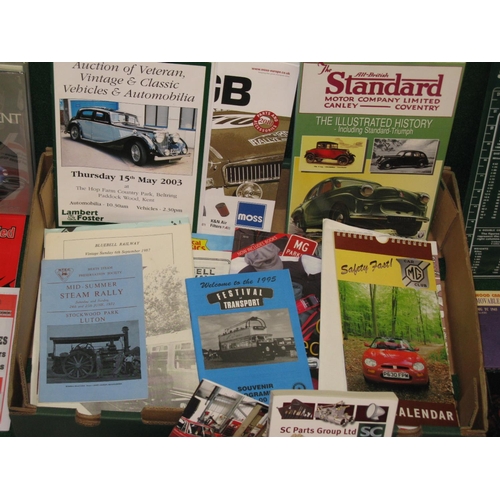 63 - Box of motoring ephemera to include: MG calendars, MG parts catalogues, show guides, auction catalog... 