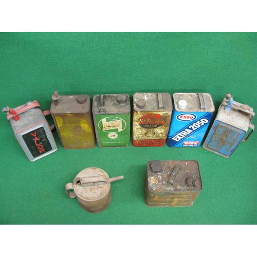 8 - Eight one gallon oil and paraffin cans from Newton, Esso, Castrol, Valor, Monitor Heaters etc