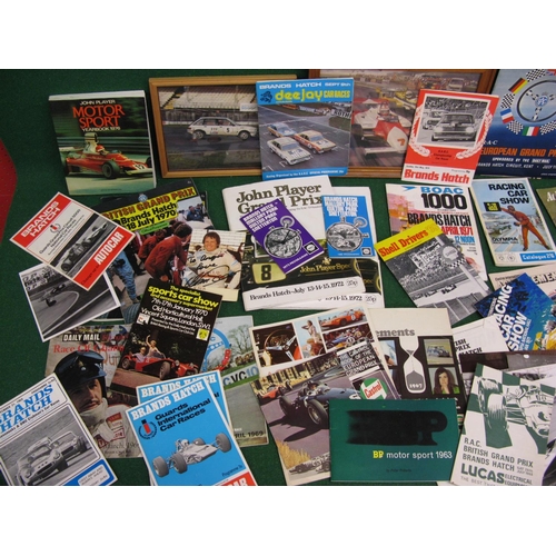 85 - Quantity of motor racing programmes, black and white photographs and ephemera from the 1960's and 19... 