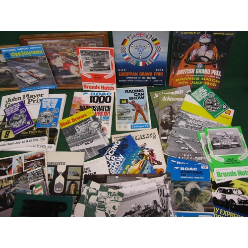 85 - Quantity of motor racing programmes, black and white photographs and ephemera from the 1960's and 19... 