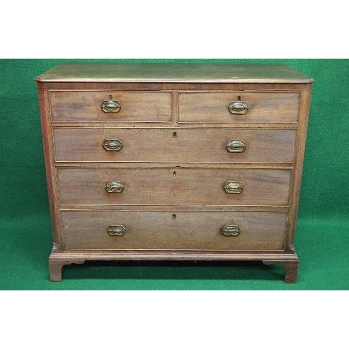 130 - Oak chest of drawers the top having moulded edge over two short and three long graduated drawers wit... 