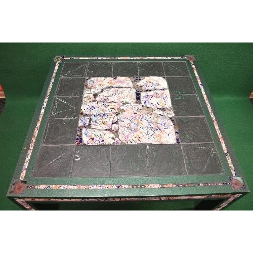 143 - Irish Tileworks coffee table having central decoration of pottery tiles with a green painted frame a... 