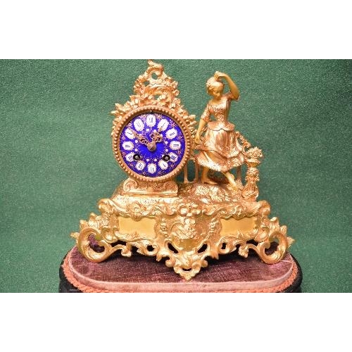 216 - Gilt metal figural mantle clock the dial having blue enamel face with blue Roman Numerals and pierce... 