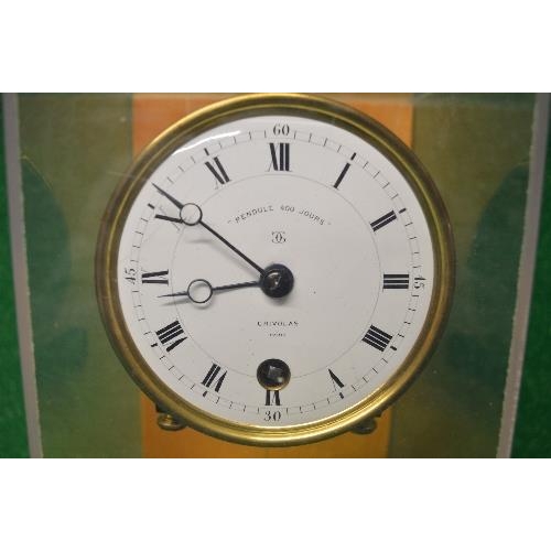 218 - Grivolas, Pendule 400 Jours Torsion clock having white enamel dial with black Roman Numerals and pie... 