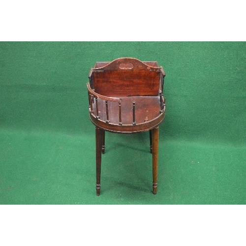 23 - Mahogany maids tray on stand the top having two sections divided by pierced carrying handle and stan... 