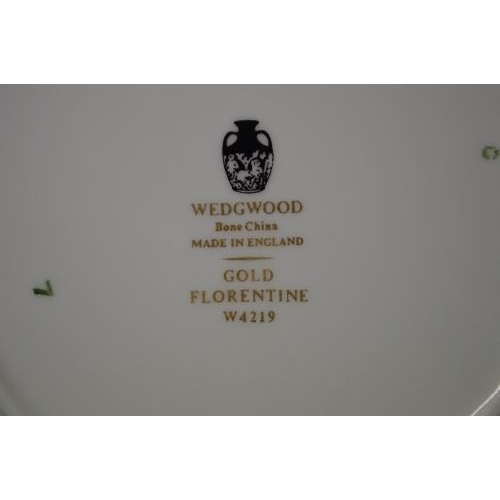 243 - Quantity of Wedgwood Gold Florentine W4219 tea and dinner ware having a gilt border on a white groun... 