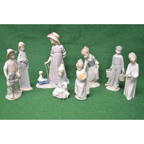 275 - Group of eight Lladro figures to comprise: girl holding fruit, small child with lamb, fishing boy, y... 