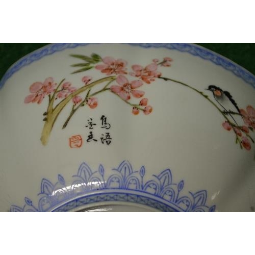 322 - Fine porcelain or possibly glass Oriental bowl having hand painted decoration of birds and blossom w... 