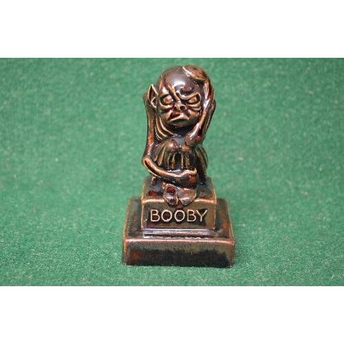 337 - Royal Doulton stoneware paperweight/figure of Booby seated on a stepped plinth base with brown glaze... 