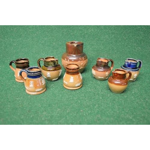 338 - Group of eight miniature Harvestware Royal Doulton jugs