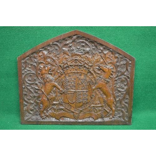 342 - Good quality oak carved panel having arched top and carved with foliate decoration surmounting the B... 