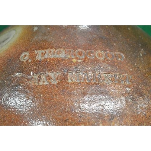 346 - Stoneware flagon having single handle and stamped C Thorogood, Hay Market with top spout - 14