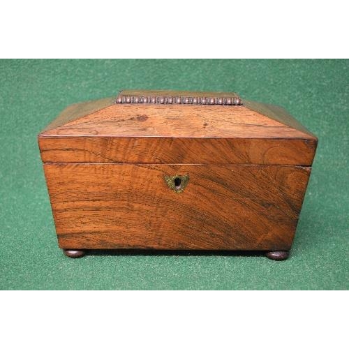 422 - 19th century rosewood sarcophagus shaped tea caddy having brass shield shaped escutcheons the top op... 