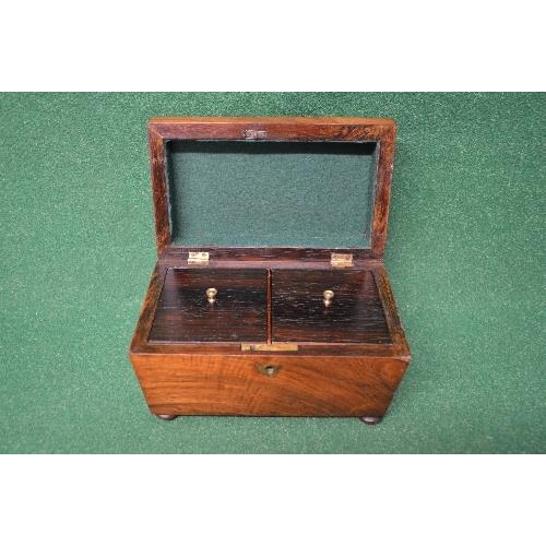 422 - 19th century rosewood sarcophagus shaped tea caddy having brass shield shaped escutcheons the top op... 