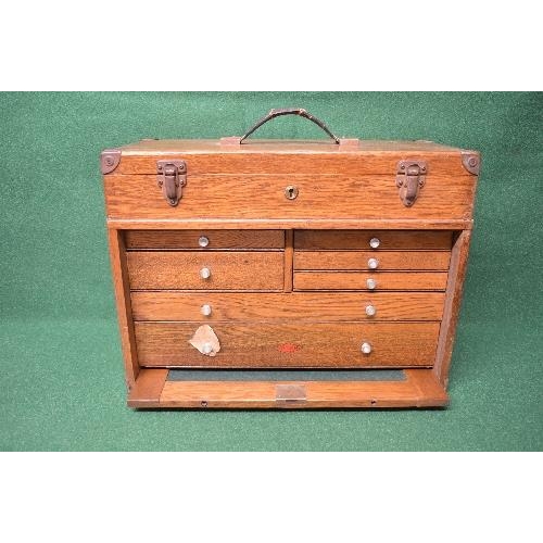 432 - Oak Neslein engineers tool chest having top carrying handle, the top opening to reveal two section i... 