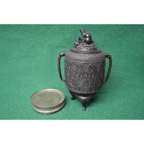 454 - Oriental bronze two handled lidded urn the lid having mouse and fruit finial, the cylindrical body h... 