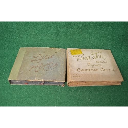 465 - Two early 20th century salesmans greetings cards example folders each containing a quantity of greet... 