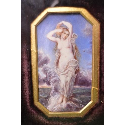 468 - Framed miniature painting of a semi nude woman standing on a rock at sea with a gilt card mount surm... 