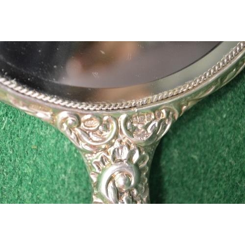 490 - Cased silver dressing table set to comprise: hand mirror, clothes brush and hair brush, marked for B... 