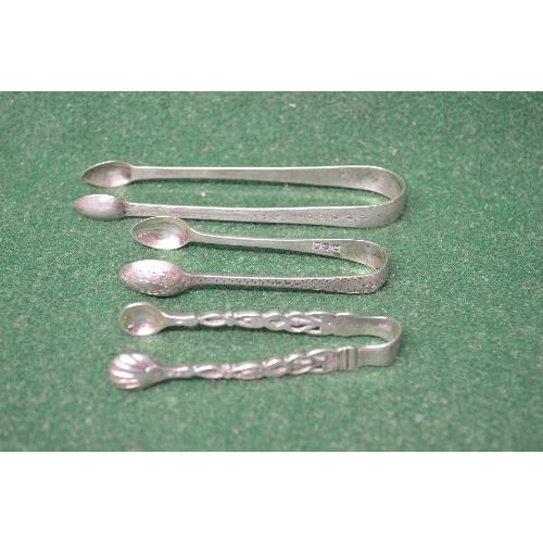 495 - Three pairs of silver sugar tongs, two marked for London the other having a Georgian hallmark