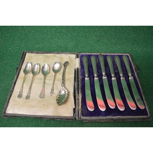 503 - Cased set of six silver handled butter knives together with four silver teaspoons and one white meta... 