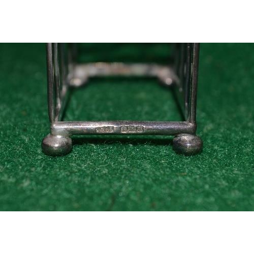 506 - Pair of silver five bar toast racks having pierced handle, marked for Sheffield