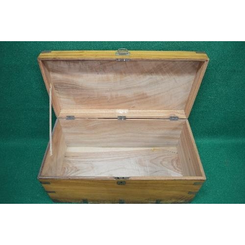 56 - Camphor wood brass bound chest having side carrying handles and opening to reveal storage space - 40... 