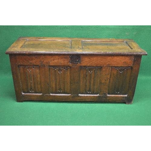 67 - Period oak coffer having two panelled lid opening to reveal right hand candle box and storage space,... 