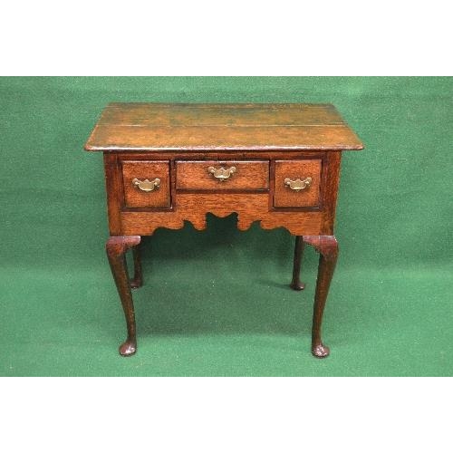 68 - Period oak lowboy the top having moulded edge over single centre drawer flanked by smaller drawers e... 