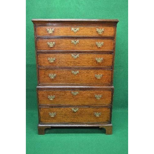 74 - 19th century oak chest on chest the top having moulded edge over four long graduated drawers with br... 