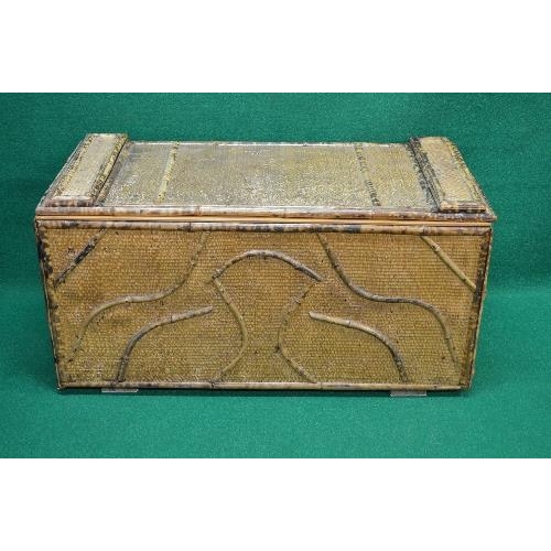 82 - Bamboo covered pine box the top lifting to reveal storage space and having metal side carrying handl... 