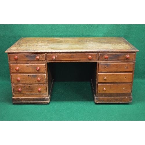 96 - Victorian pine desk the top having moulded edge over three drawers with turned knob handles supporte... 