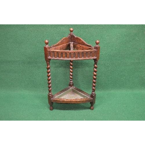 97 - Oak barley twist corner stick stand having two umbrella sections supported by three barley twist col... 