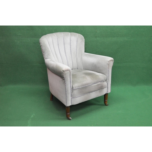 105 - Upholstered tub style armchair having padded back and arms and overstuffed seat, standing on turned ... 