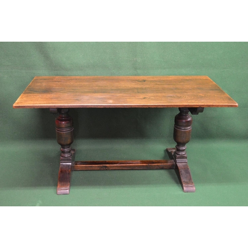 11 - 20th century oak refectory dining table the top being supported on two bulbous stretchered legs, sta... 