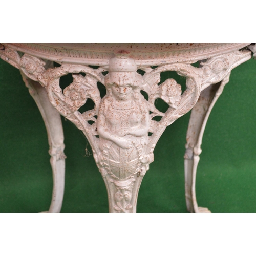 153 - Iron based circular table having wooden top the base being supported by a pierced frieze with Britan... 