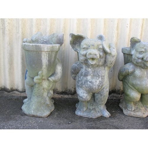 160 - Four fibre/cement pig formed planters  - 27.5