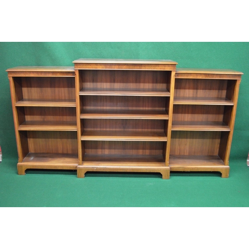 18 - Walnut breakfront bookcase having stepped top with moulded edge, the centre section having three adj... 