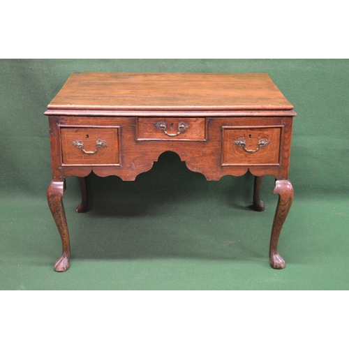 20 - 19th century oak lowboy having single central drawer flanked by single drawers, standing on cabriole... 