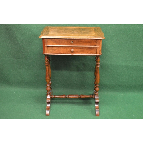 24 - 19th century walnut work table having shaped top over two drawers, standing on turned stretchered le... 