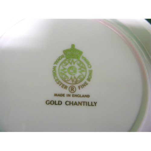 259 - Royal Worcester Gold Chantilly pattern part dinner service having a gilt decoration on a white groun... 