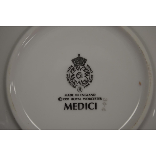 280 - Royal Worcester Medici pattern part tea and dinner service, white ground with a marbled green and gi... 