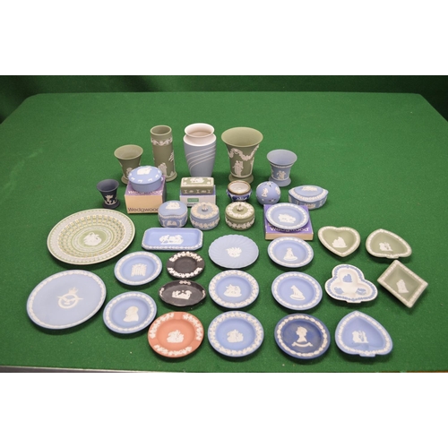 327 - Group of Wedgwood Jasperware with blue, white, green, pink and black grounds with white applied deco... 