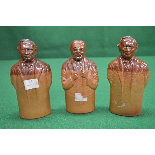 343 - Group of three Doulton earthenware flasks in the form of figures - 7.25