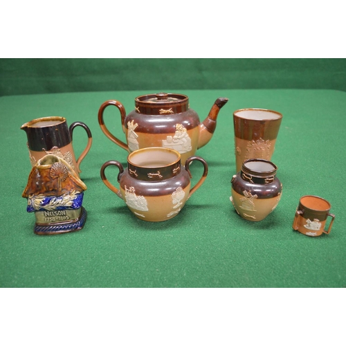 352 - Group of Doulton pottery Harvestware to comprise: teapot, two jugs, beaker, two handled sugar bowl, ... 