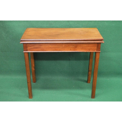 37 - 19th century mahogany fold over tea table the top opening to reveal polished surface, standing on sq... 